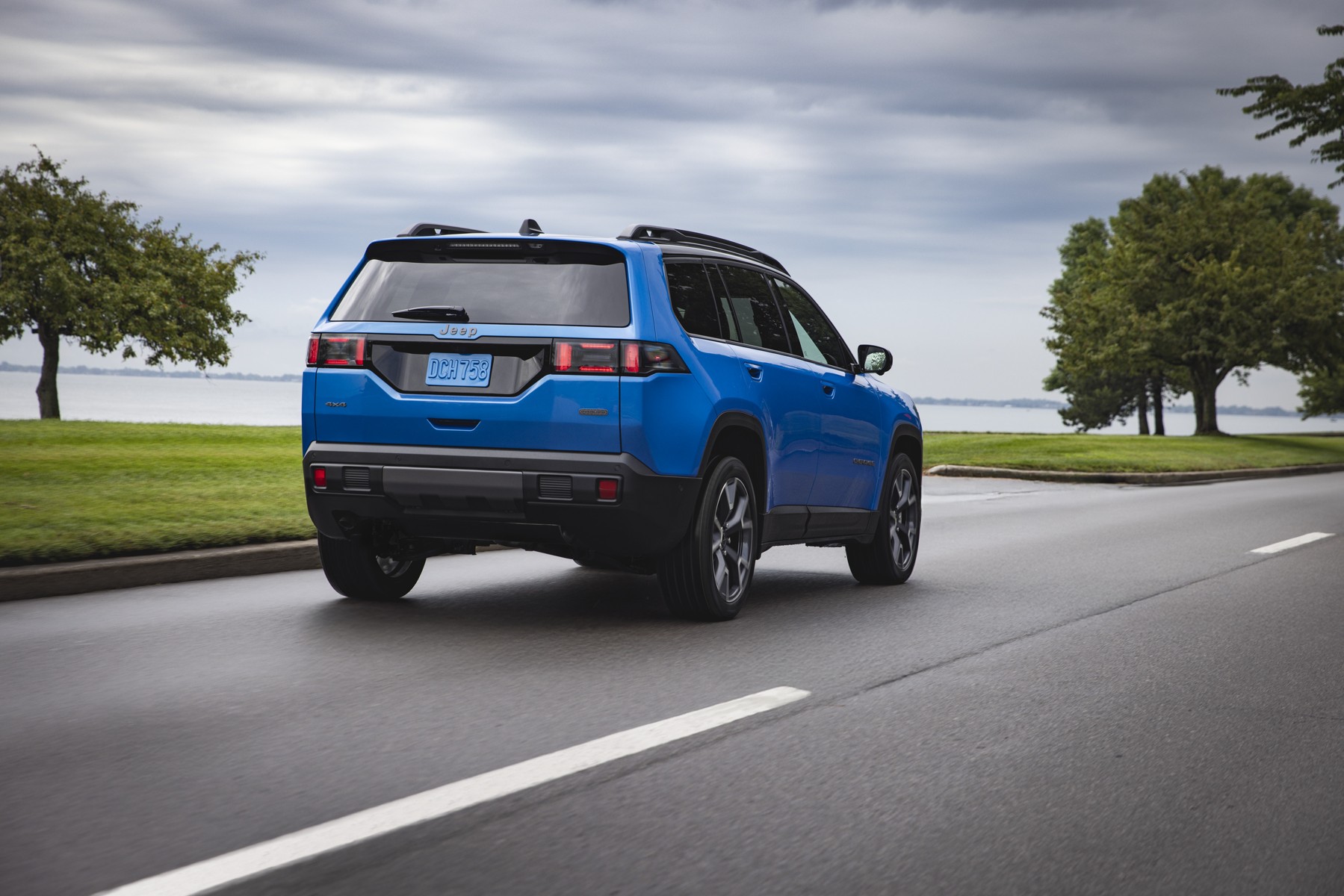 Rear view of the redesigned blue Jeep Cherokee